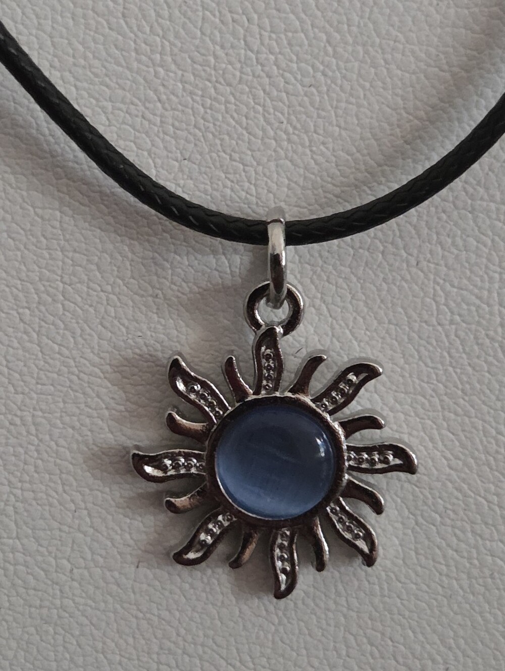 Sunburst Pendant Necklace with Blue Center on Black Cord